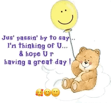 Teddy Bear Holding Smiley Face Balloon