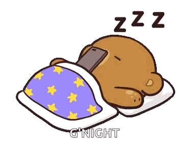 Teddy Bear in Bed with Phone on Head