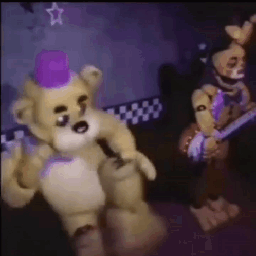 Teddy Bear In Purple Hat Next To Another Teddy Bear GIF