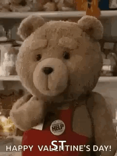 Teddy Bear In Red Apron By Refrigerator GIF