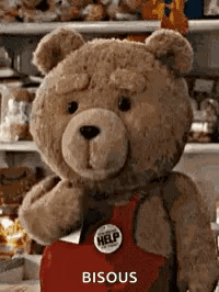 Teddy Bear In Red Apron With Help Button GIF