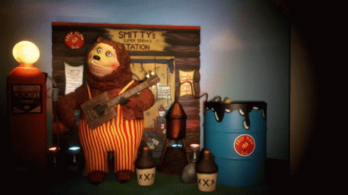 Teddy Bear Playing Guitar at Service Station