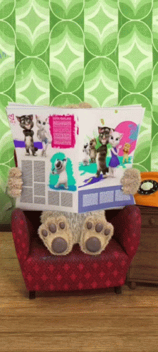Teddy Bear Reading Magazine With Cats GIF
