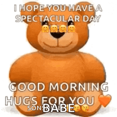 Teddy Bear Sitting On Bed With Good Morning Hugs GIF