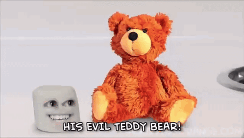 Teddy Bear With Horns Next to Marshmallow His Evil Teddy Bear