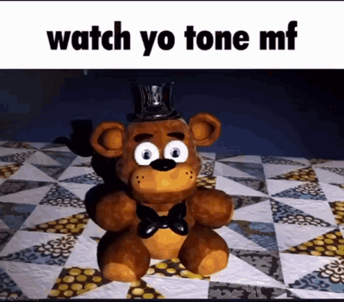 Teddy Bear with Top Hat and Bow Tie on Quilt