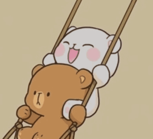 Teddy Bears Sitting on Swing