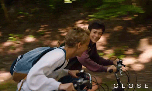Teenager Boys Riding Bike Happily GIF