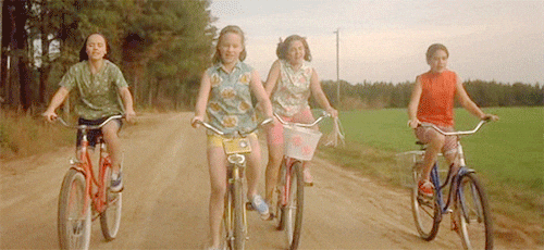 Teenagers Riding Bike Together GIF