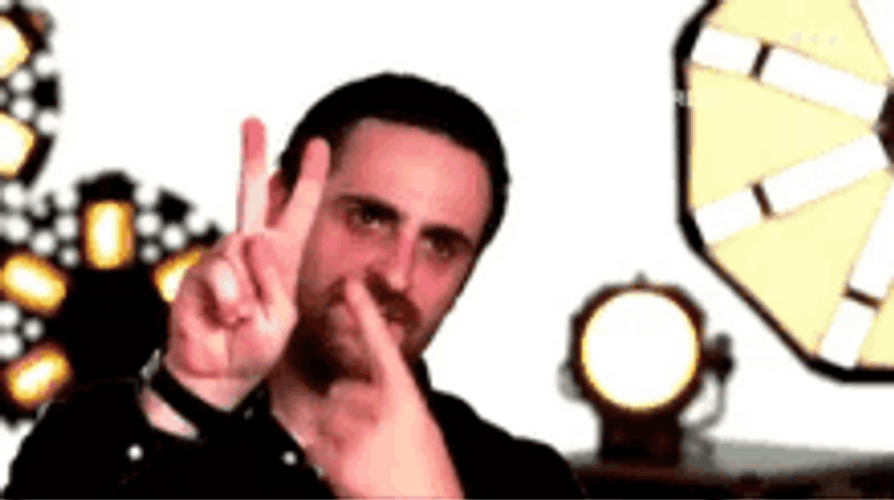 Television Presenter Camille Combal 2 Finger Sign GIF