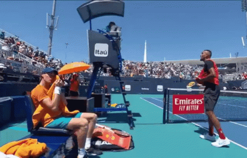 Tennis Court With Emirates Fly Better Sign GIF