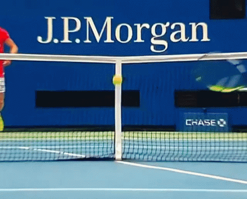 Tennis Court With J.P. Morgan Sign GIF