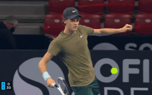 Tennis Player Holding Racket And Sof Sign GIF
