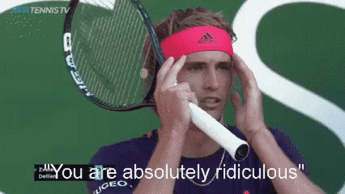 Tennis Player Holding Racquet to Head Saying Ridiculous