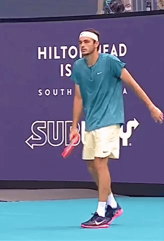 Tennis Player in Front of Hilton Head South Sign