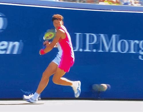 Tennis Player Running In Front Of Blue JPMorgan Wall GIF