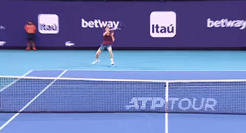Tennis Player Serving Court With Itau Betway Ads GIF