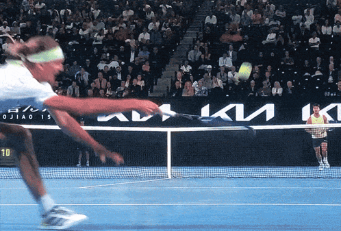 Tennis Player Swings Racket at Kia Ad