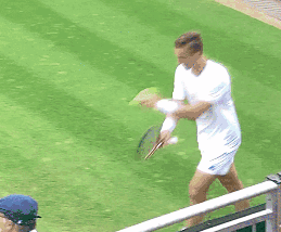 Tennis Player Walking on Court
