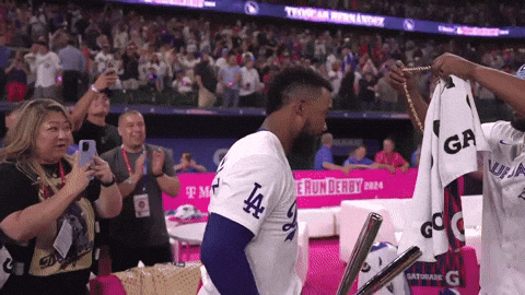 Teoscar Hernandez Wears Necklace As Welcome Treat GIF