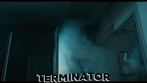 Terminator Arnold Schwarzenegger Firing Gun GIF