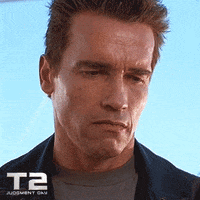 Terminator Arnold Schwarzenegger Gritted Teeth Smile GIF