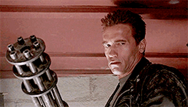 Terminator Arnold Schwarzenegger One Side Smile GIF