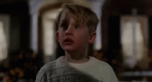 Young Macaulay Culkin Running Terrified GIF