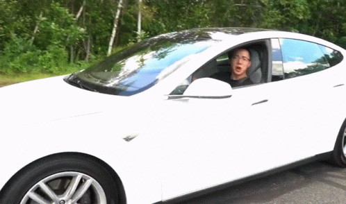 White Tesla Model S With Asian Guy GIF