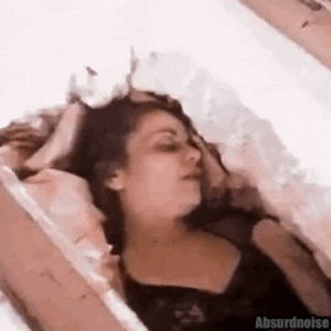 Texas Chainsaw Coffin Shocked Face GIF