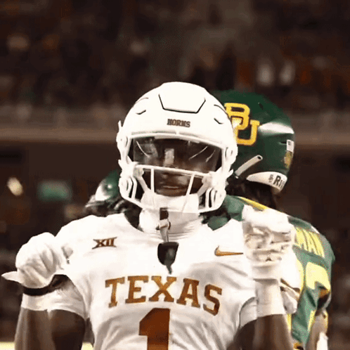 Texas Football Player in White Helmet and Gloves