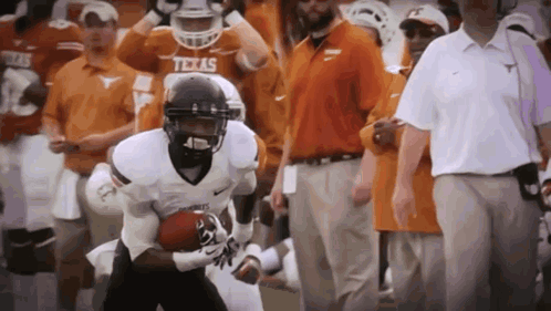 Texas Football Player Running With Ball GIF