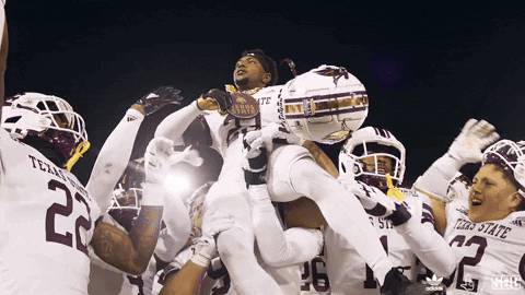 Texas State Football Players Celebrate Touchdown