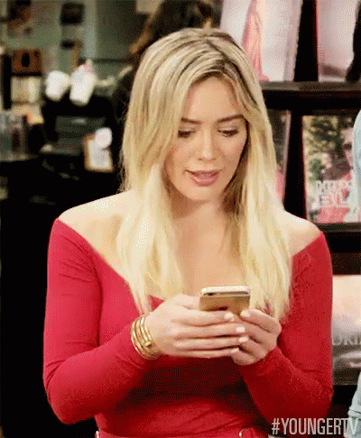 Vibrant Hillary Duff Texting GIF