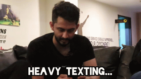 Man Focused On Heavy Texting GIF