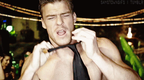 Thad Castle Alan Ritchson Shirtless With Necktie GIF