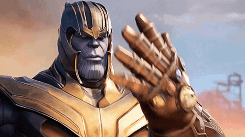 Thanos From Avengers Infinity War Is Wearing A Golden Glove And Making A Peace Sign . GIF