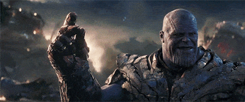 Thanos From The Movie Avengers Endgame Is Smiling And Giving A High Five GIF