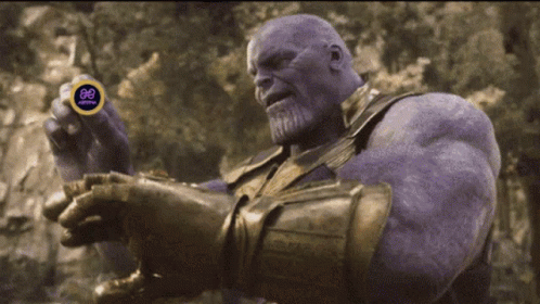 Thanos Holding Coin With EE