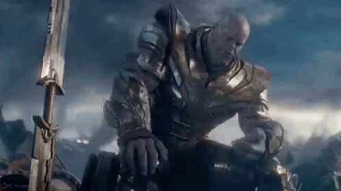 Thanos Is Holding A Sword In His Hand In A Scene From Avengers Endgame . GIF