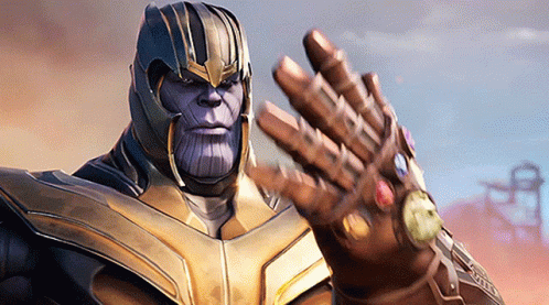 Thanos Is Wearing A Helmet And Holding His Infinity Gauntlet In His Hand GIF