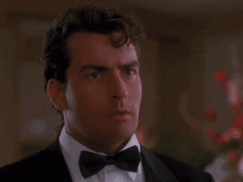 Thats Hot Steaming Collar Charlie Sheen GIF