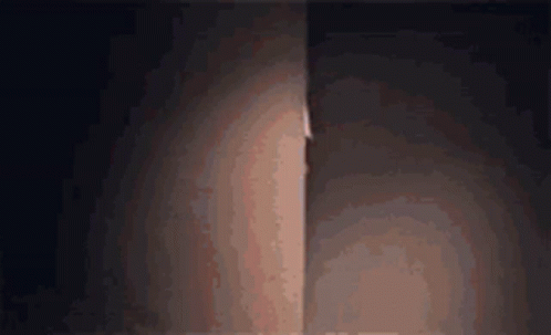 The Accountant Peeking Through A Corner GIF