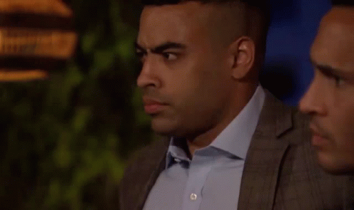 The Bachelorette Annoyed Justin Shrug GIF