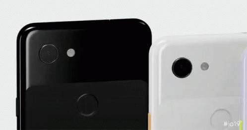 The Back Of A Black And White Phone With The Number I019 On It GIF