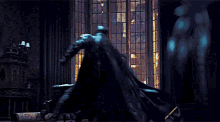 The Batman Carrying Catwoman Scene GIF