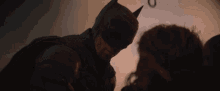 The Batman Rescuing People Scene GIF