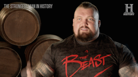 The Beast Showed His Muscular Biceps GIF