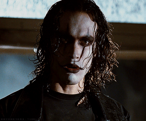 The Crow Brushing Off His Shoulder GIF