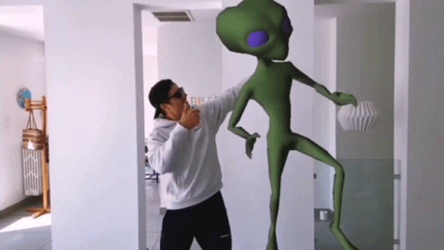The Dancing Et With A Boy In A Hoodie GIF